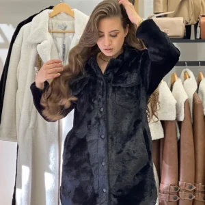 Manteau à capuche en fourrure